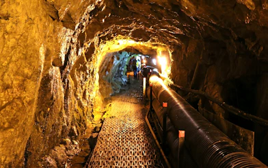 Third Infiltration Tunnel interior with walkway and lighting.