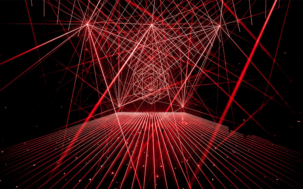 Red laser light installation at AMAZE Amsterdam Immersive Experience.