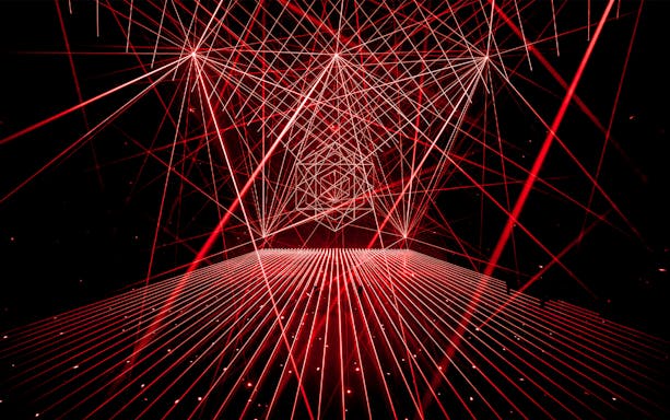 Red laser light installation at AMAZE Amsterdam Immersive Experience.
