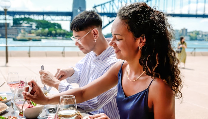 People enjoying a meal at Midden by Mark Olive, Sydney Opera House