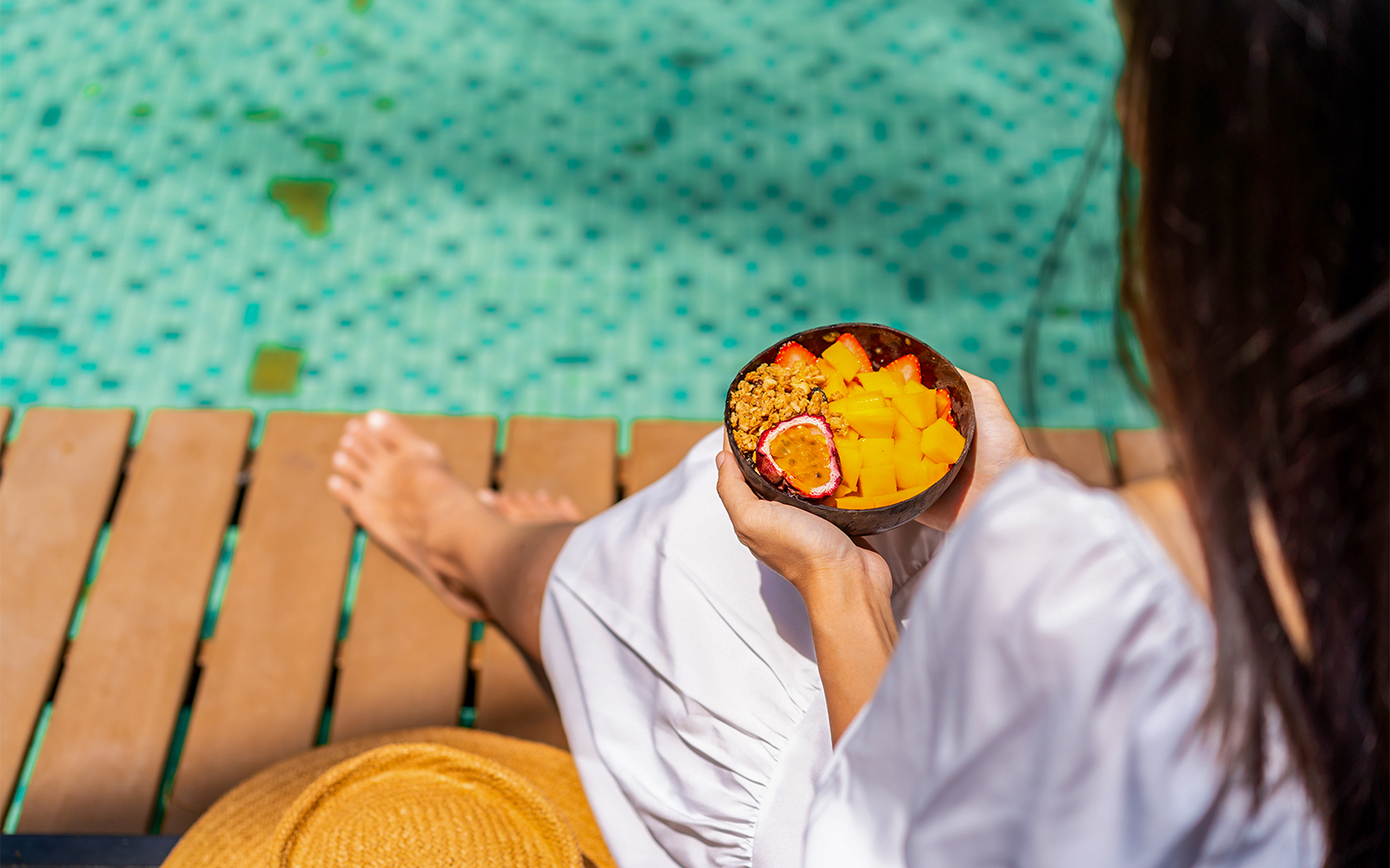 Visitors enjoying water slides at ESCAPE Penang theme park, Malaysia.