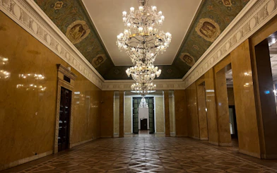 Chandeliers and ornate ceiling in the Palace of Culture and Science, Warsaw.