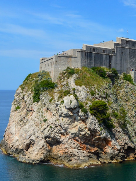 St. Lawrence Fortress perched on a rocky cliff overlooking the Adriatic Sea in Dubrovnik.