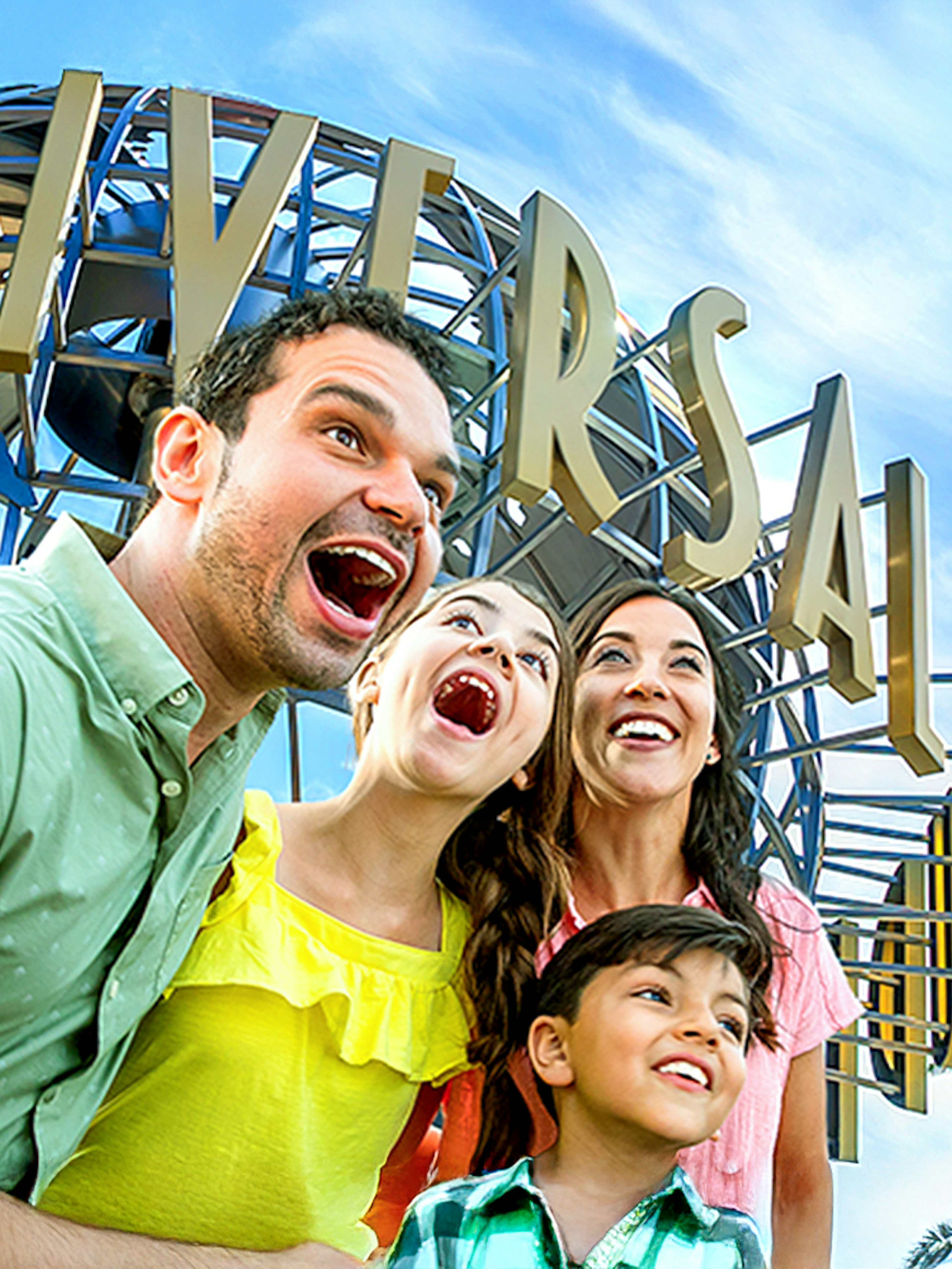 Family enjoying Universal Studios Hollywood entrance globe.