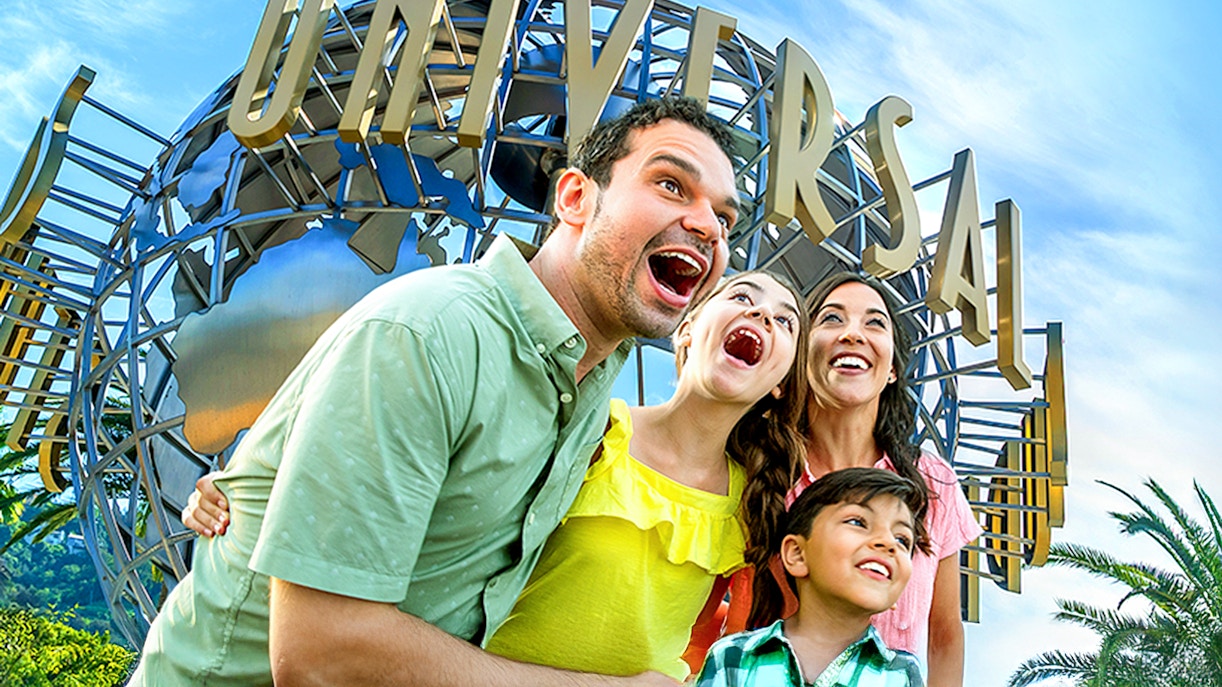 Family enjoying Universal Studios Hollywood entrance globe.