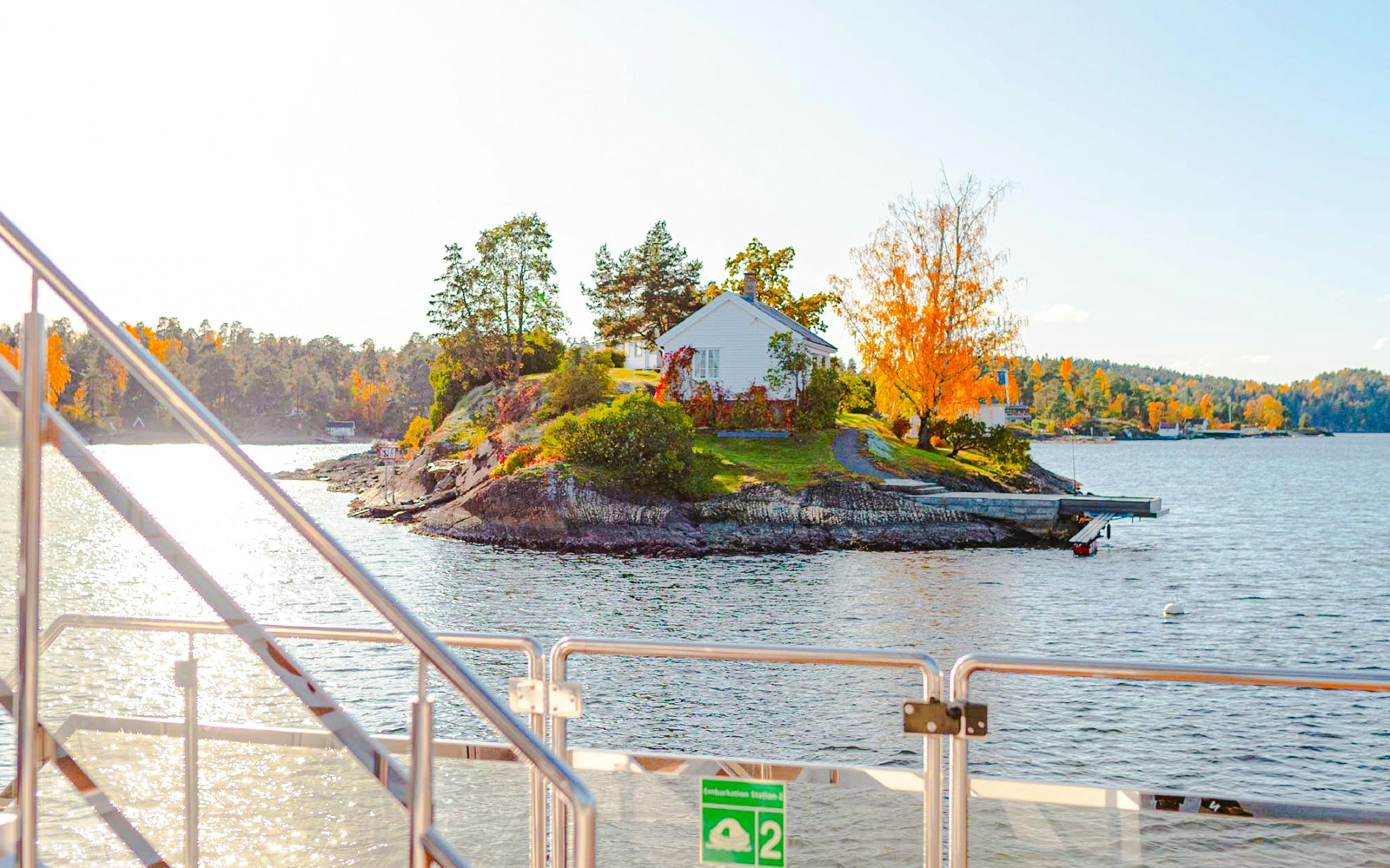 Silent fjord cruise from Oslo with guide, showcasing serene waters and scenic landscapes.