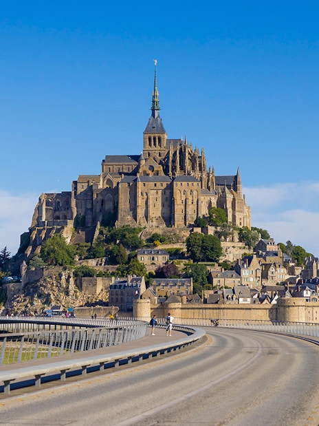 Mont Saint Michel abbey and causeway in Normandy, France.