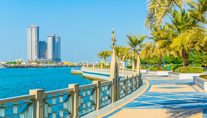 Corniche Abu Dhabi Big Bus tour with city skyline and waterfront view.