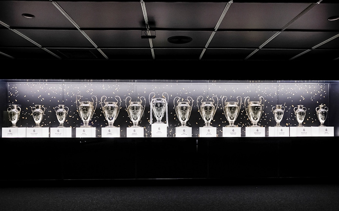 Trophies on display at Santiago Bernabeu Stadium tour.