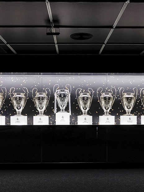 Trophies on display at Santiago Bernabeu Stadium tour.