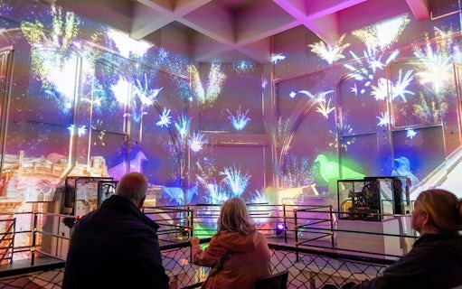 Guests watching a light show inside the Royal Liver Building, Liverpool.