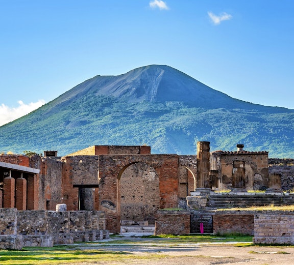 Ruins of Pompeii with Mount Vesuvius in the background, Campania, Italy.