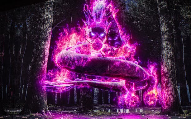 Illuminated snake in forest exhibit, Arte Museum Dubai.