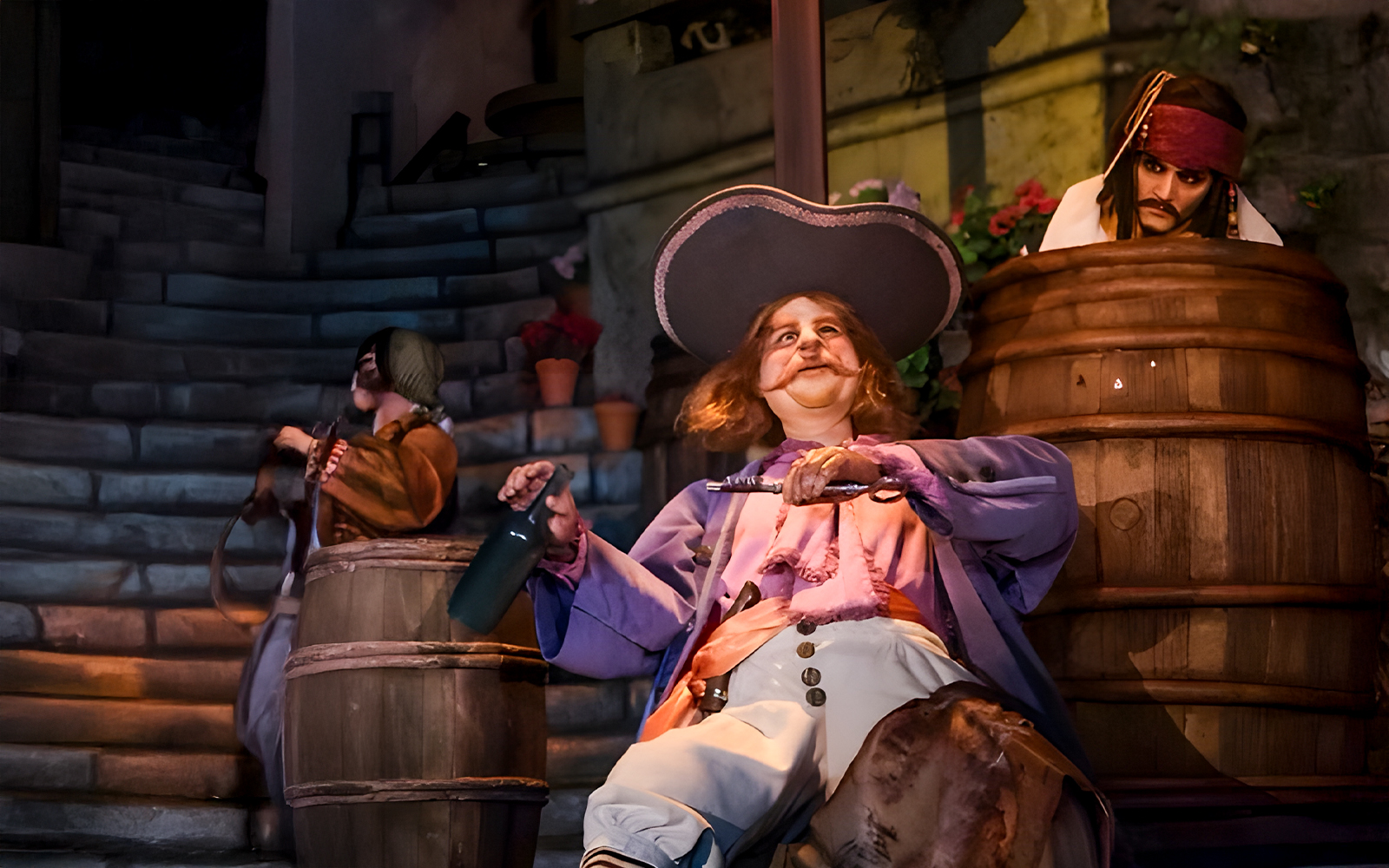 Pirate figures in barrels on the Pirates of the Caribbean ride at Disneyland, California.