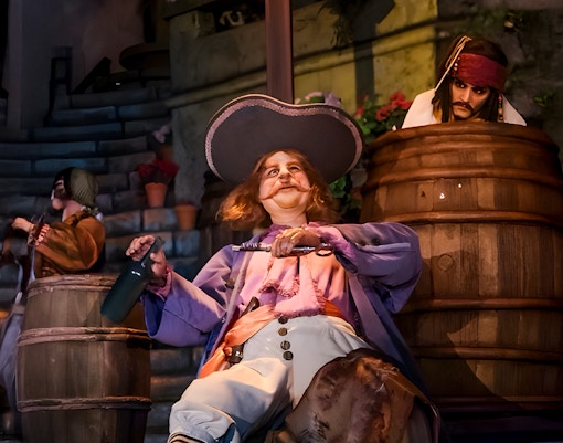 Pirate figures in barrels on the Pirates of the Caribbean ride at Disneyland, California.