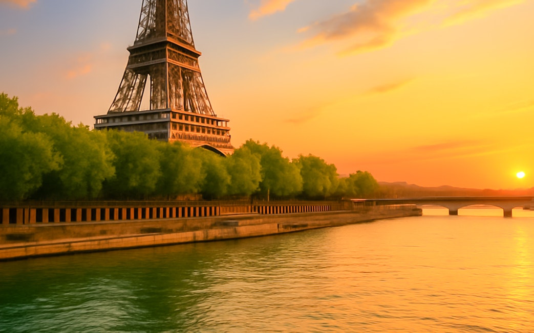 Eiffel Tower view from Seine River at sunset, Paris Canal Cruise, France.
