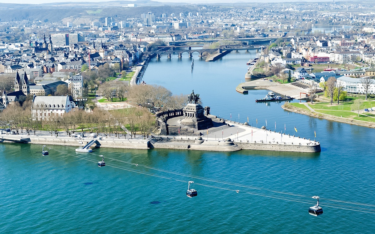Aerial view of Koblenz from cable car, featuring Deutsches Eck and Rhine River.