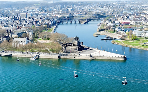 Aerial view of Koblenz from cable car, featuring Deutsches Eck and Rhine River.