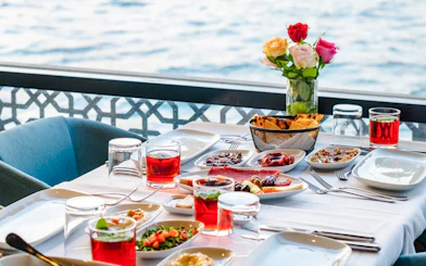 Breakfast spread on Le Vapeur Magique with Bosphorus view.