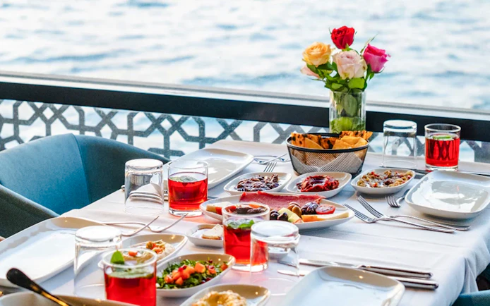 Breakfast spread on Le Vapeur Magique with Bosphorus view.