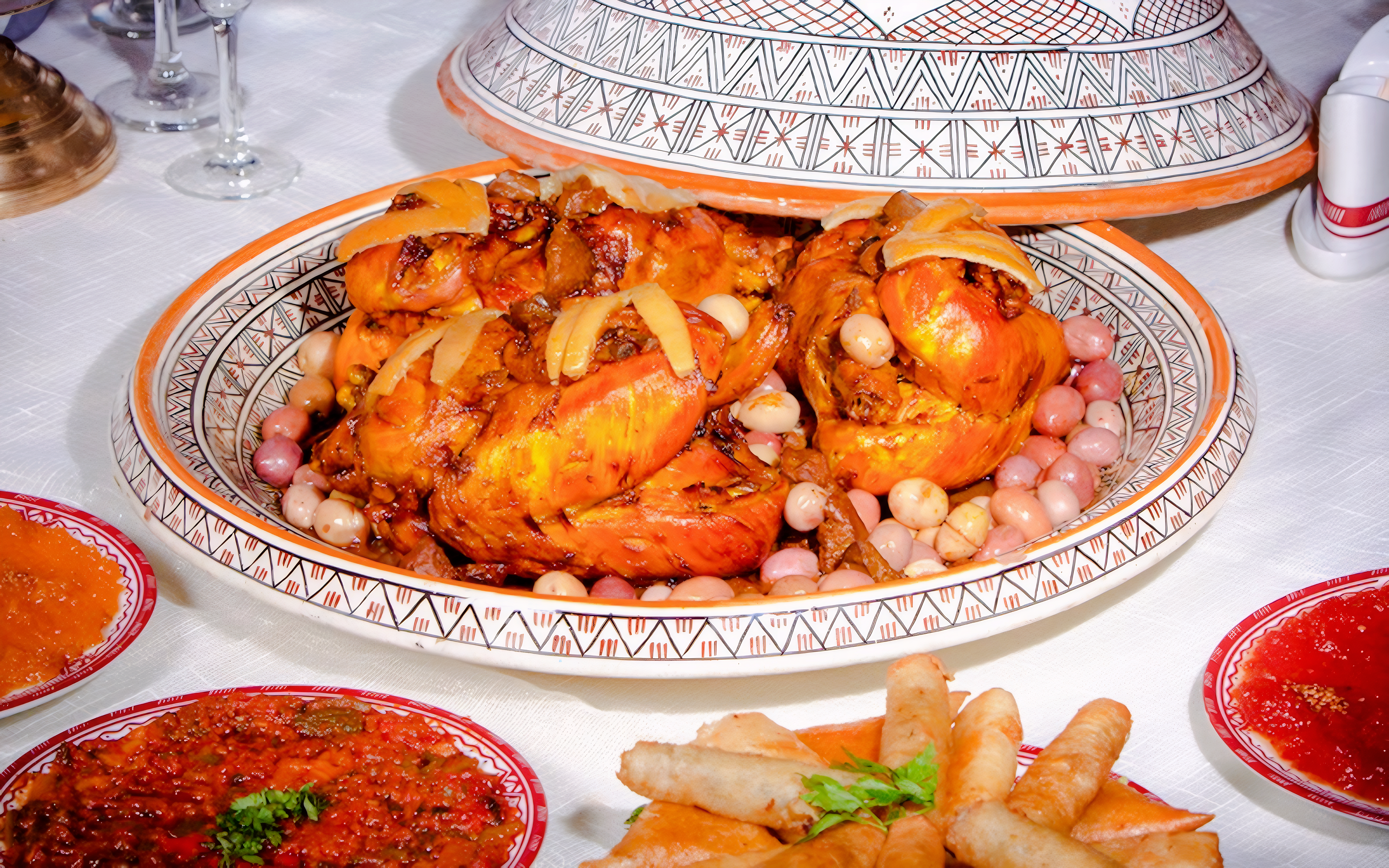 Traditional Moroccan tagine with chicken and olives at Dar Essalam dinner show.