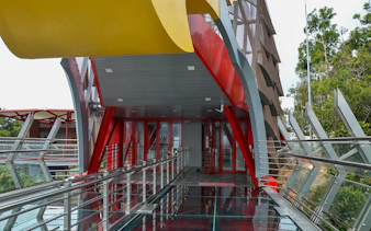 Langkawi SkyBridge entrance with glass walkway and modern architecture.