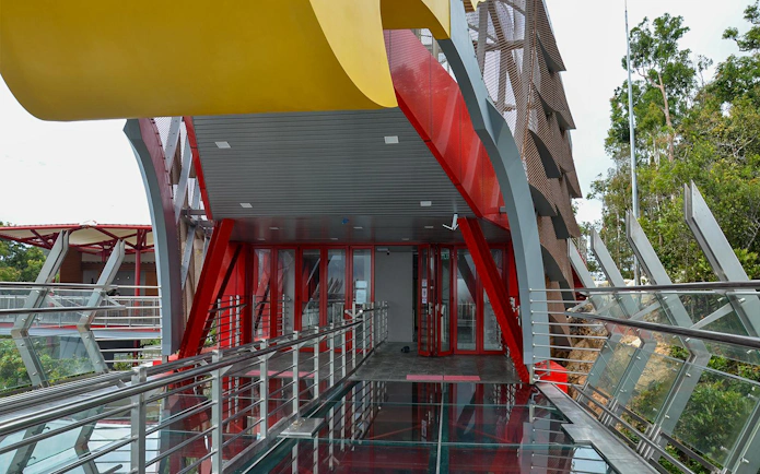 Langkawi SkyBridge entrance with glass walkway and modern architecture.