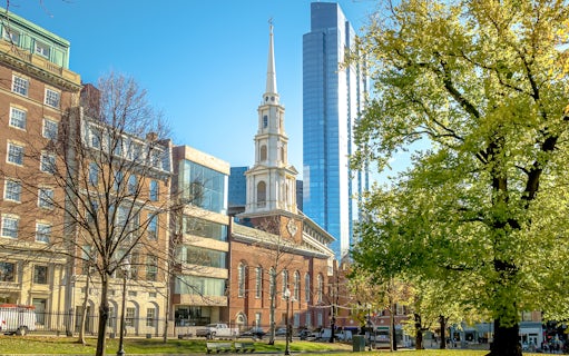 Park Street Church and Boston Common with city skyline, Boston, Massachusetts.