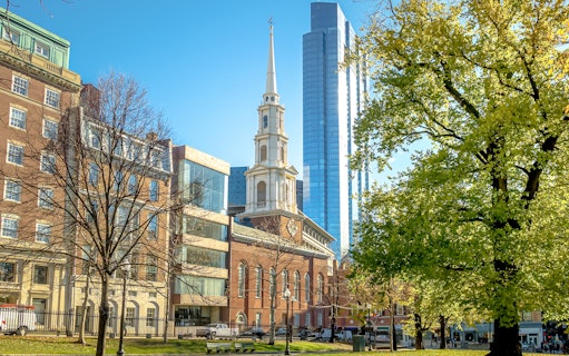 Park Street Church and Boston Common with city skyline, Boston, Massachusetts.