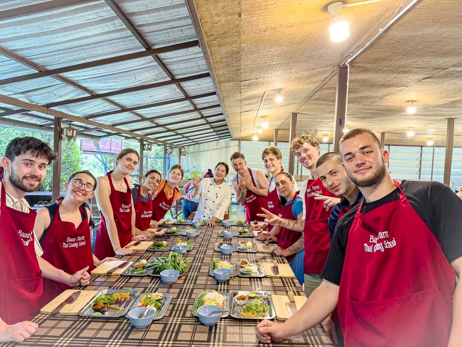 Participants in a Thai cooking class at Baan Farm Thai Cooking School, Chiang Mai.