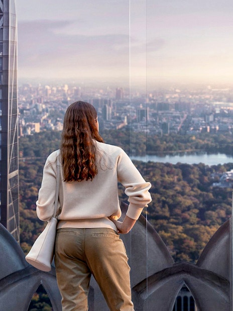 Visitors viewing New York City skyline from Top of the Rock Observation Deck.