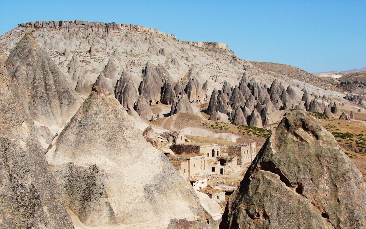 Unique rock formations and ancient dwellings in Selime, Cappadocia, Turkey.