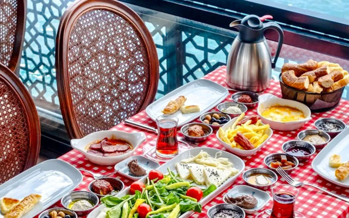 Turkish breakfast spread on a table at Le Vapeur Magique, overlooking the Bosphorus.