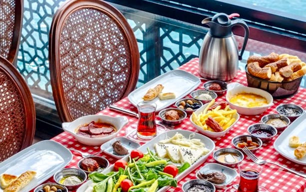 Turkish breakfast spread on a table at Le Vapeur Magique, overlooking the Bosphorus.