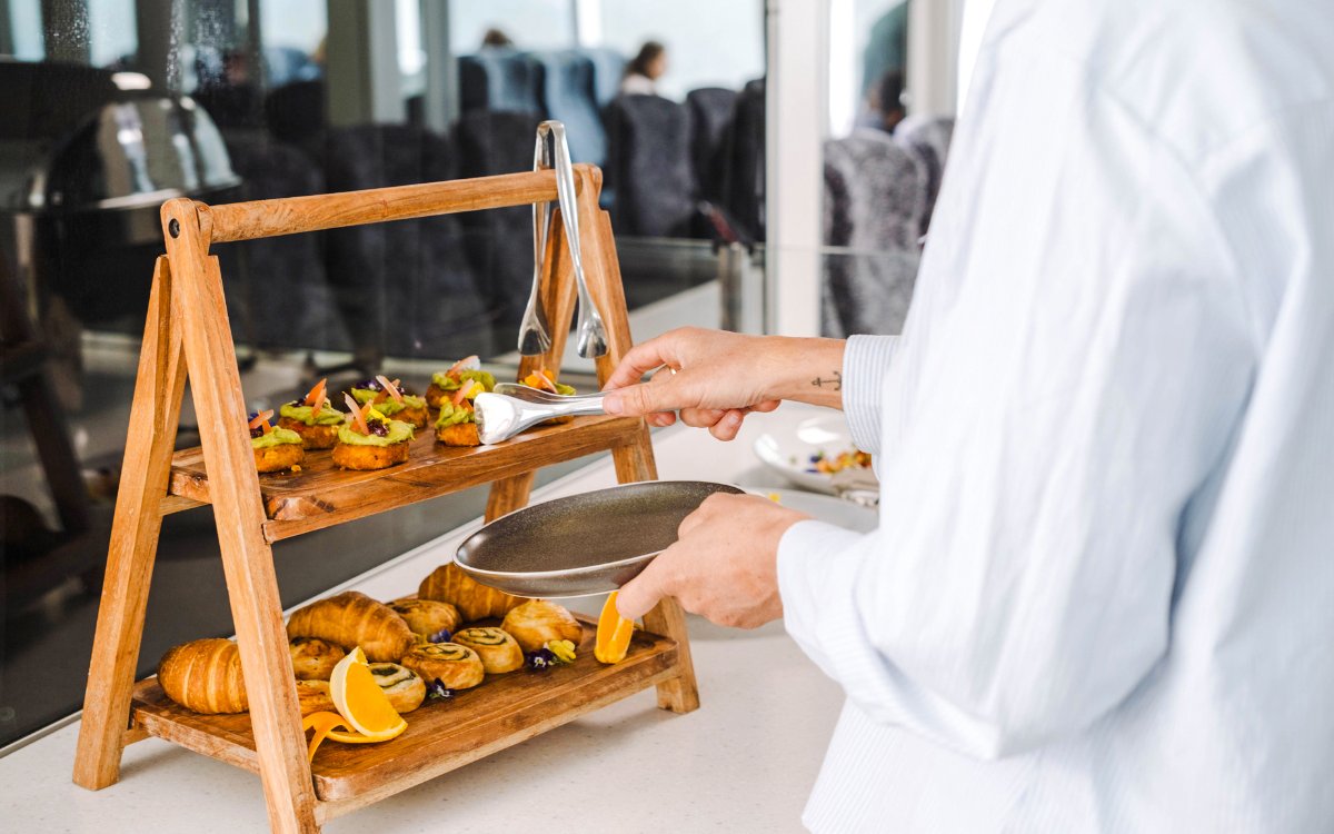 Buffet selection on Milford Sound Nature Cruise with pastries and appetizers.