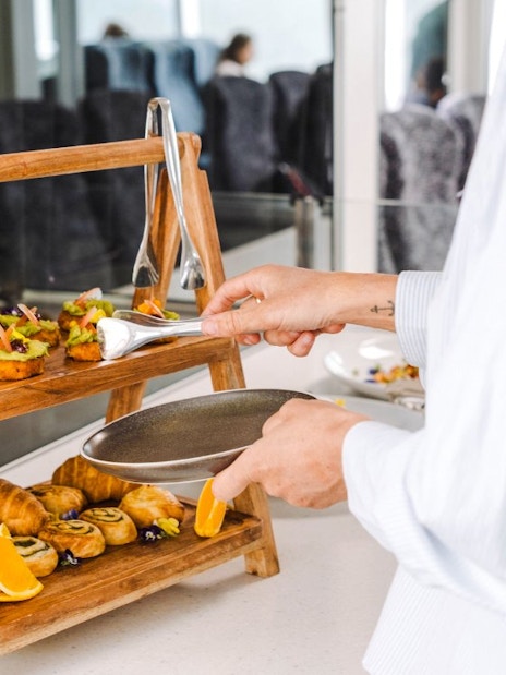 Buffet selection on Milford Sound Nature Cruise with pastries and appetizers.