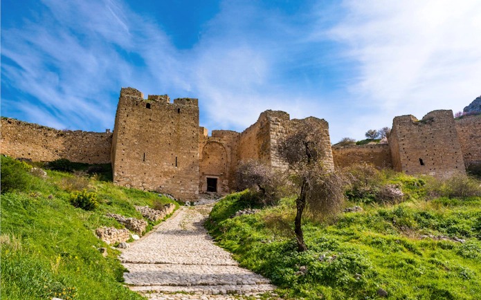 Acrocorinth Fortress stone walls and entrance, Upper Corinth, Greece.