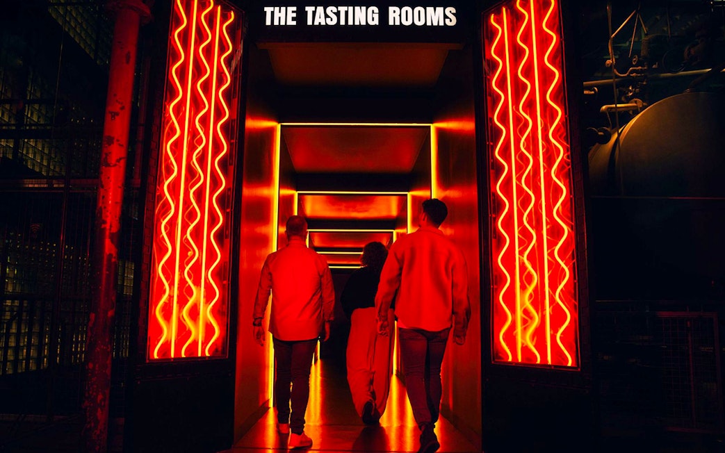 Guests entering the illuminated tasting rooms at the Guinness Storehouse.