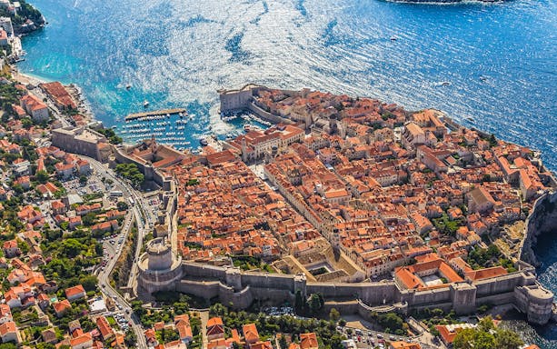Aerial view of Dubrovnik's Old Town and city walls by the Adriatic Sea.
