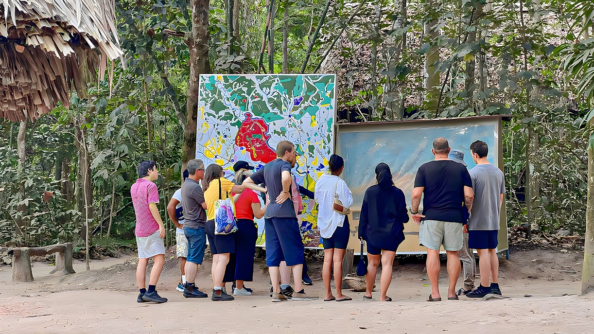 Tour group at entrance of Cu Chi Tunnels in Ho Chi Minh City, Vietnam.