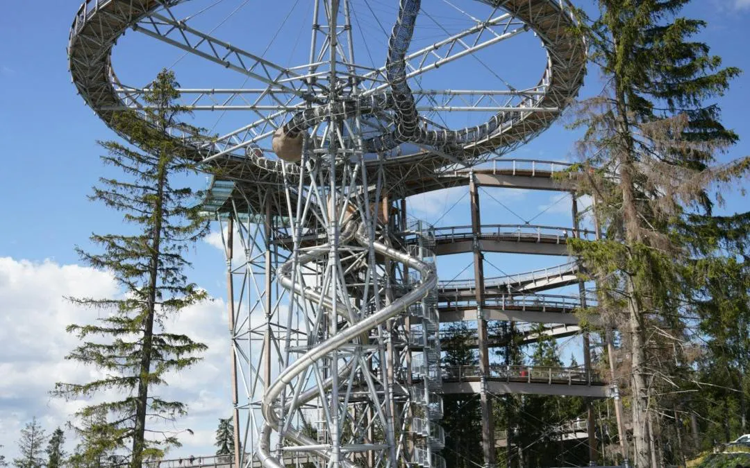 SkyWalk Heart of Poronin structure surrounded by trees, near Zakopane.