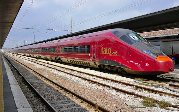 High-speed Italo train at a station, connecting Milan to Florence.