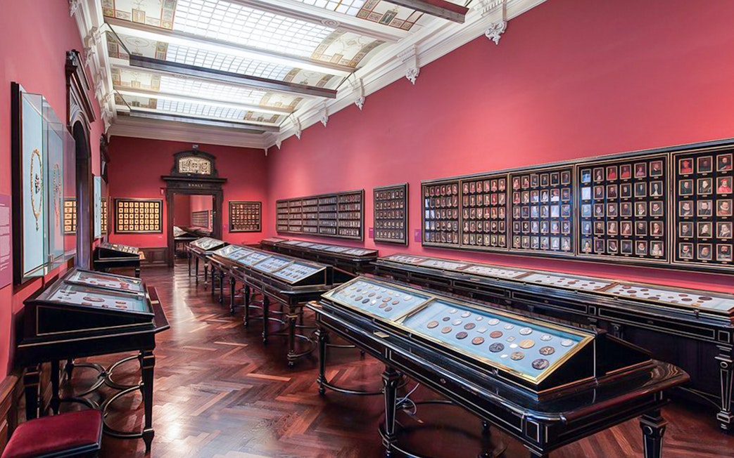 Coin Cabinet room with display cases at Kunsthistorisches Museum Vienna.