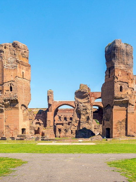 Ruins of the Baths of Caracalla in Rome, showcasing ancient Roman architecture.