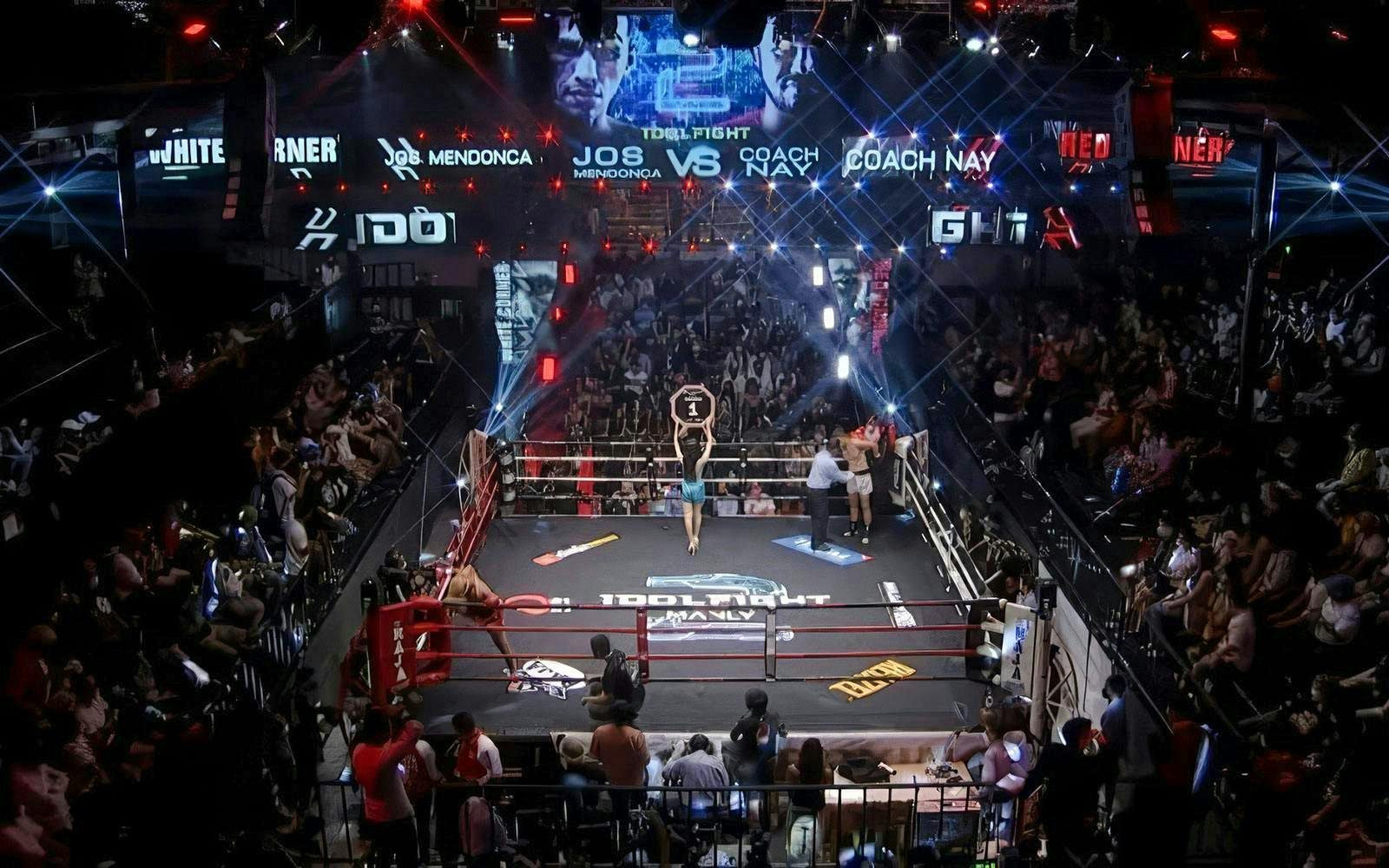 Muay Thai fight at World Siam Stadium in Bangkok with a packed audience.