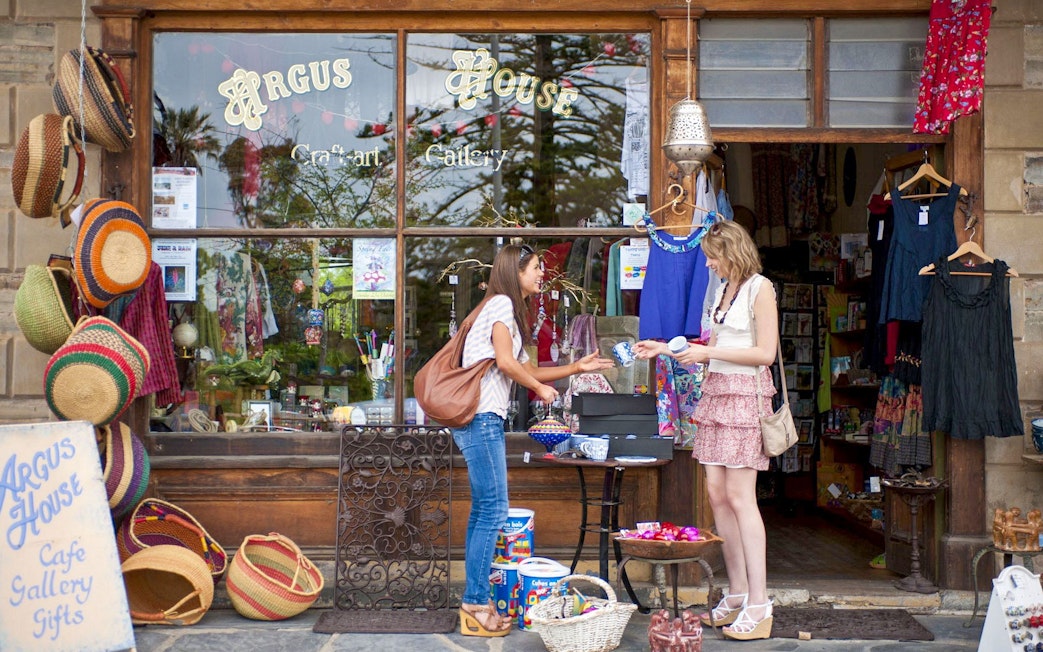 Shoppers at Argus House craft gallery in Victor Harbor, browsing local handmade goods.