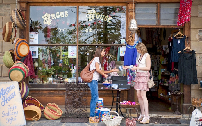 Shoppers at Argus House craft gallery in Victor Harbor, browsing local handmade goods.