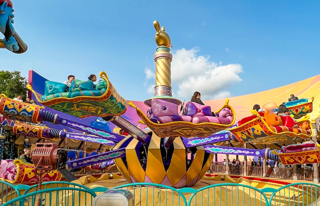 Les Tapis Volants ride with colorful flying carpets at Disneyland Paris.