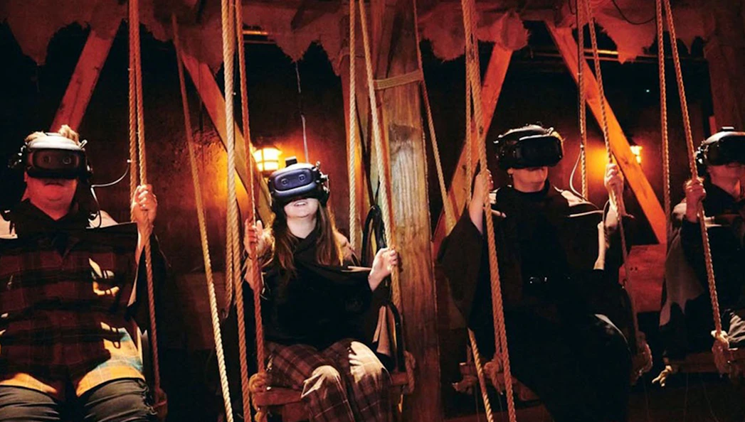Visitors experiencing The Gunpowder Plot VR tour with headsets in immersive setting.