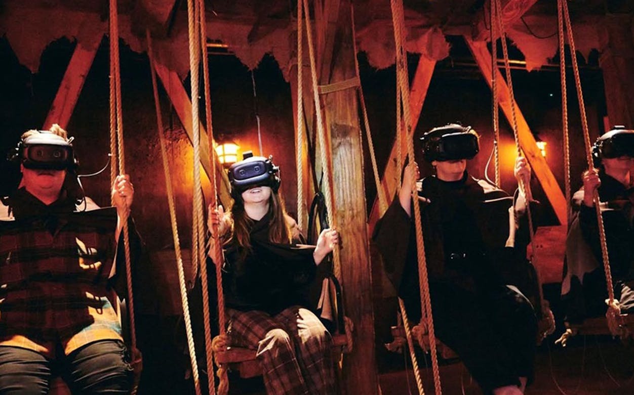 Visitors experiencing The Gunpowder Plot VR tour with headsets in immersive setting.